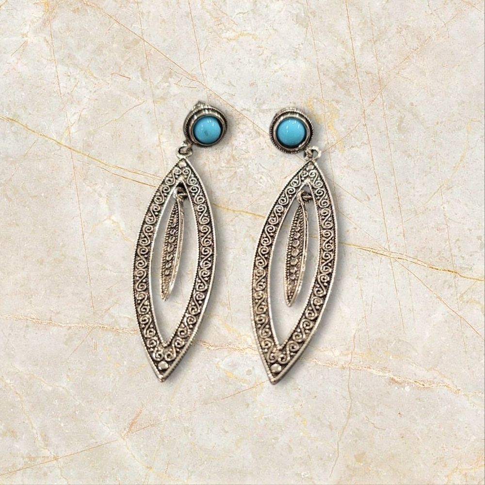 Silver and Turquoise Blue Dangle Earrings with Intricate Design